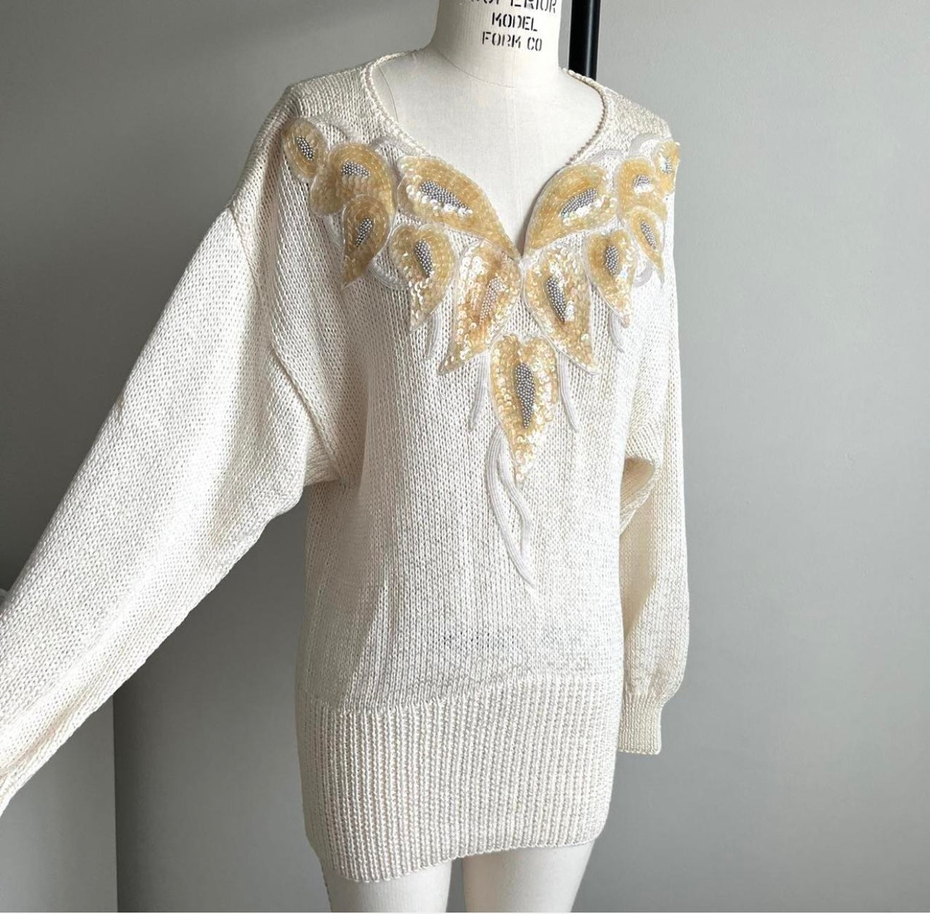 80's vintage white and gold sequin embroidered/embellished glam statement sweater with a V-neckline. Brand is Nannell!